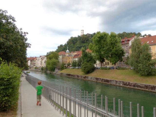 Wet but happy in Ljubljana with children in the rain